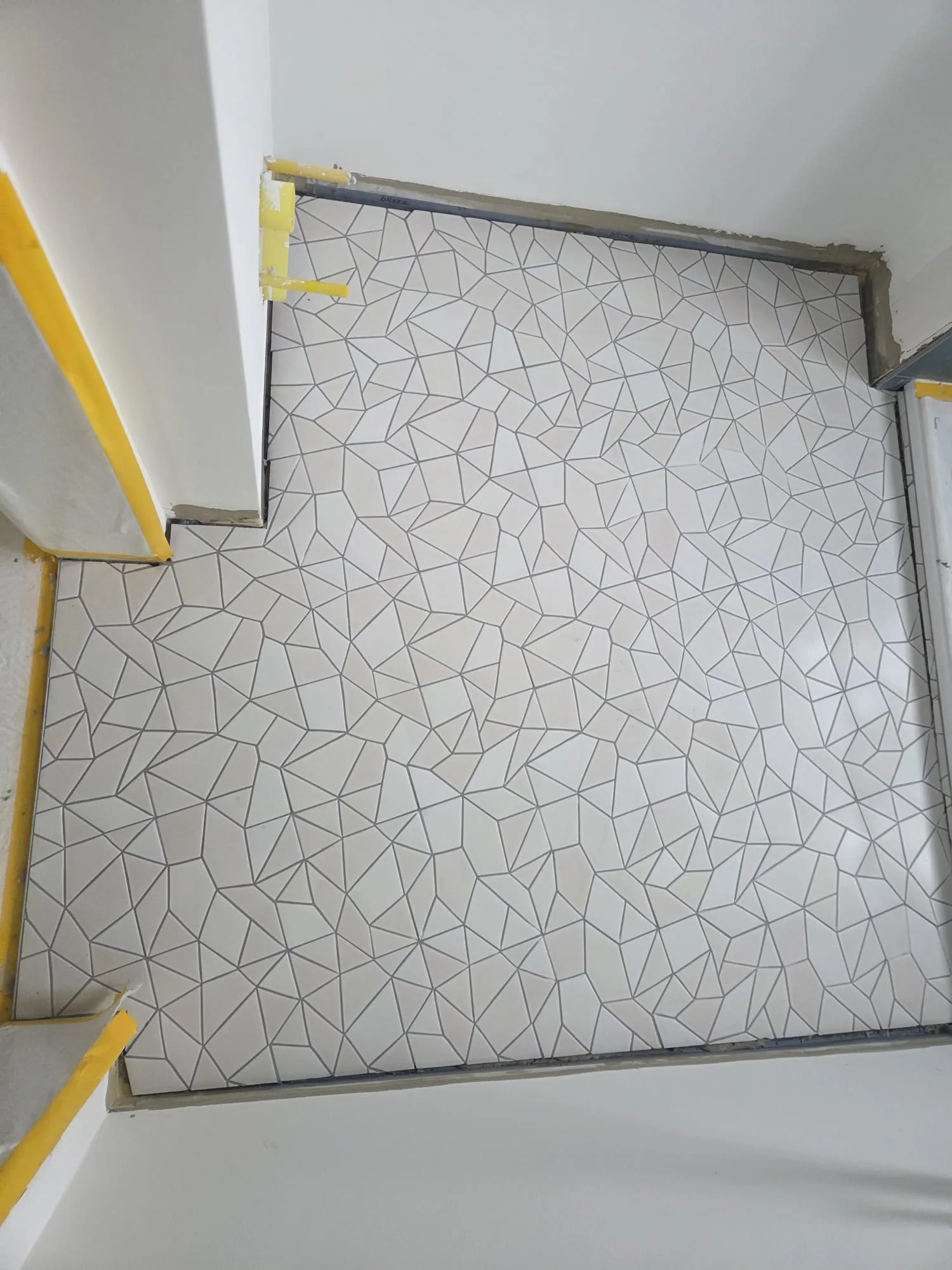 Aufwändig verlegter Mosaikboden – Handwerk von Fliesen Wangler